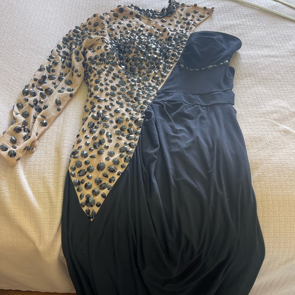 Sherry Hill gown worn twice. Long, one sleeve, open back.